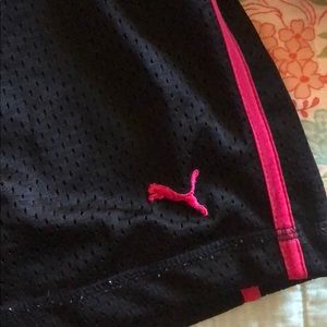 Women’s black and pink Puma athletic shorts